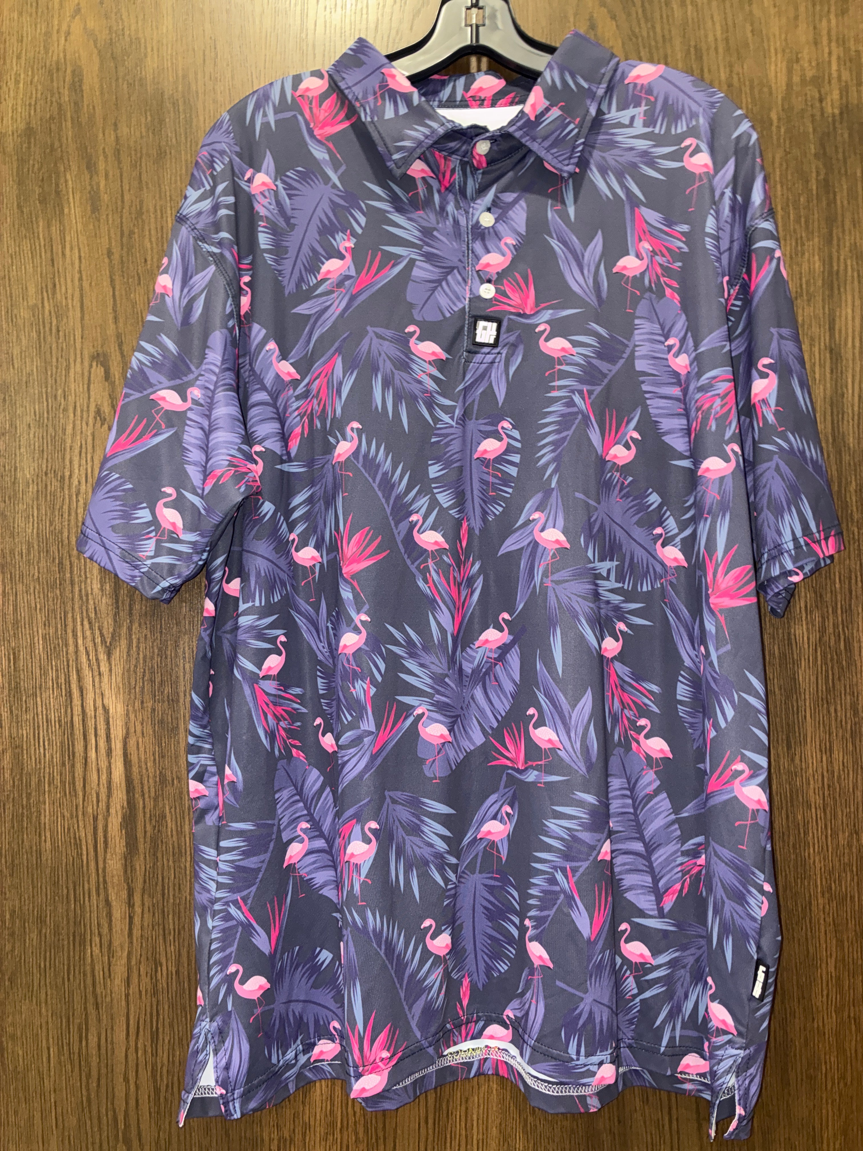 Greater Half Men's Mingos Polo featuring a blue-grey tropical palm leaf and pink flamingo performance print Size XL